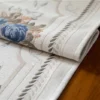 Detail table runner Camilla putih dengan motif floral