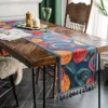 Table Runner Rijks Warna-warni – Maiika Table runner Rijks warna-warni dengan motif dekoratif di meja makan