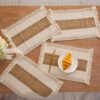 Placemat Visby 5 krem 30x50 cm digunakan sebagai alas piring di meja makan
