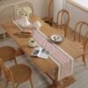 Table runner Visby 9 warna cream red sebagai dekorasi meja makan - Maiika
