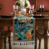 Table runner Vittorio dengan motif floral sebagai dekorasi meja makan