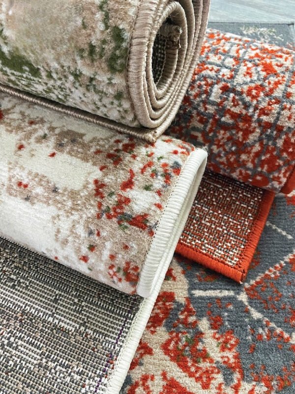 Detail Karpet Bella Maiika Detail tepi dan gulungan Karpet Bella Maiika